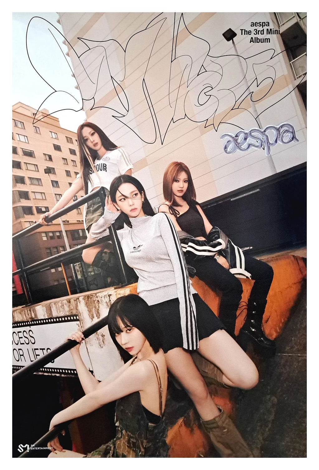 aespa My World group poster with four members posing on outdoor stairs in urban setting with graffiti text.