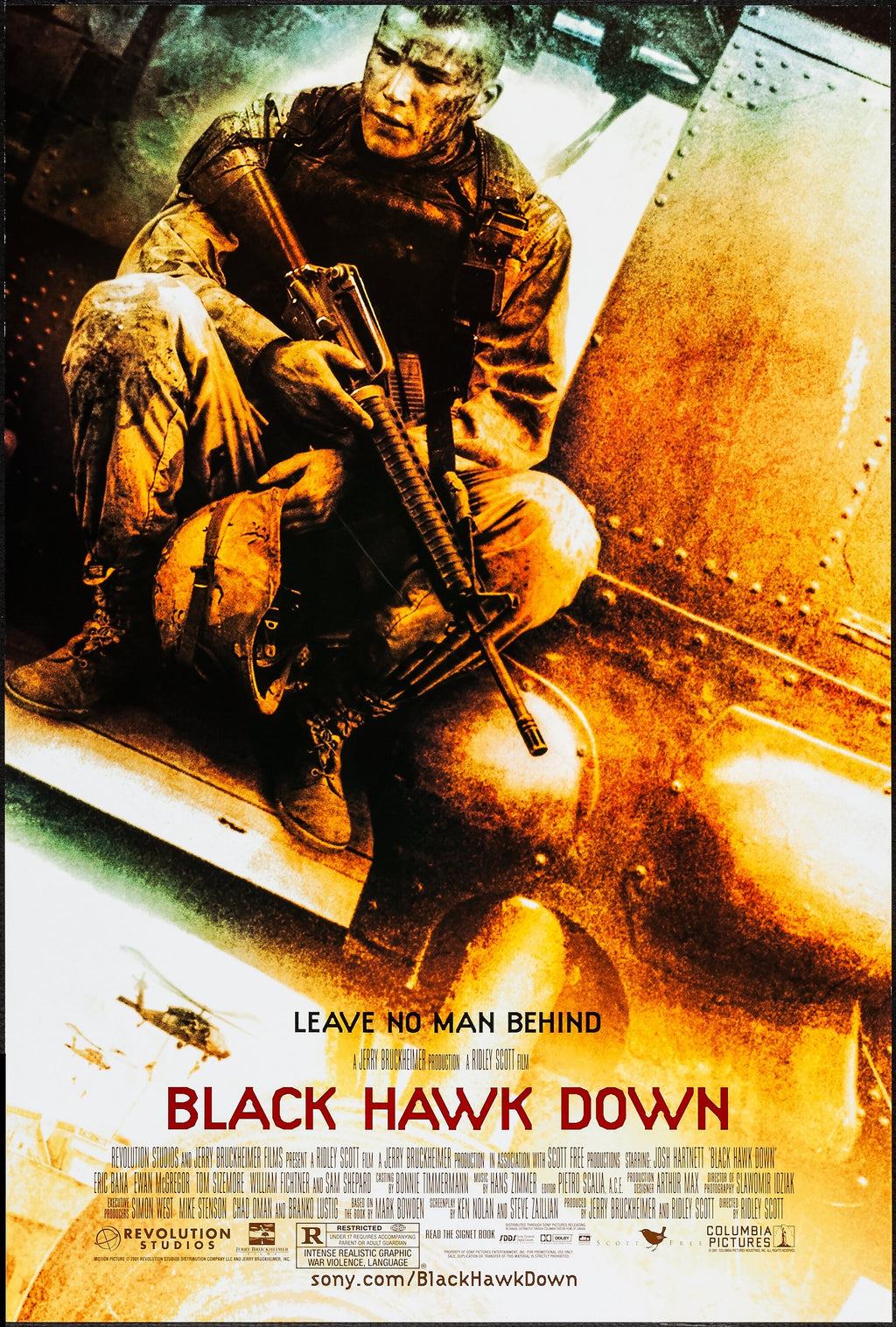 Black Hawk Down 2001 movie poster featuring a US soldier sitting on a helicopter with a rifle, dramatic orange battlefield lighting and helicopters in the background, war film directed by Ridley Scott.