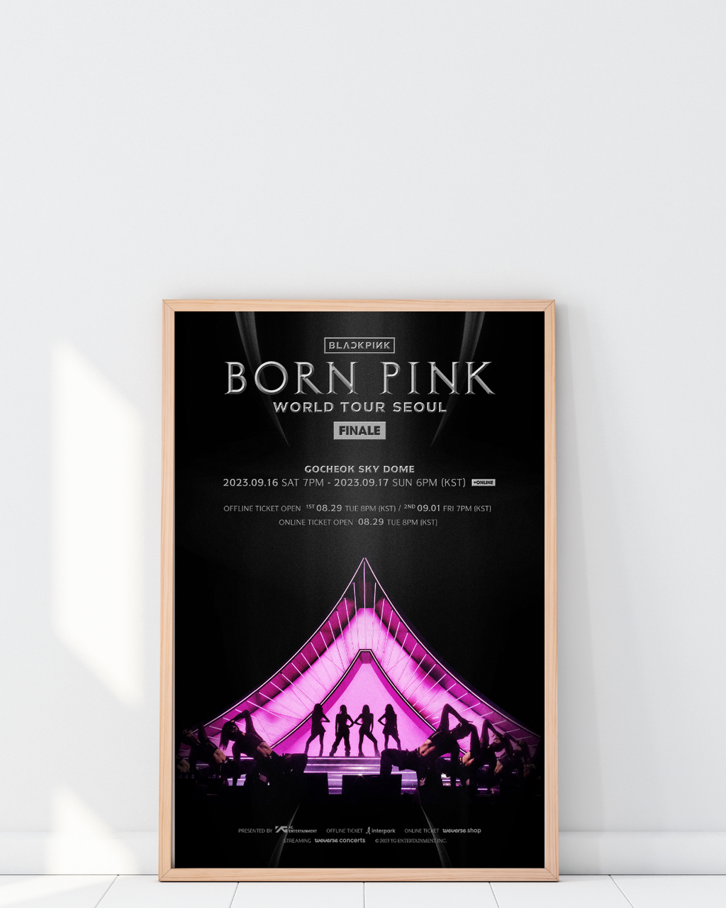 Framed BLACKPINK Seoul finale poster showcasing a bold stage design with pink lighting and performance silhouettes, creating a dramatic concert-inspired display.
