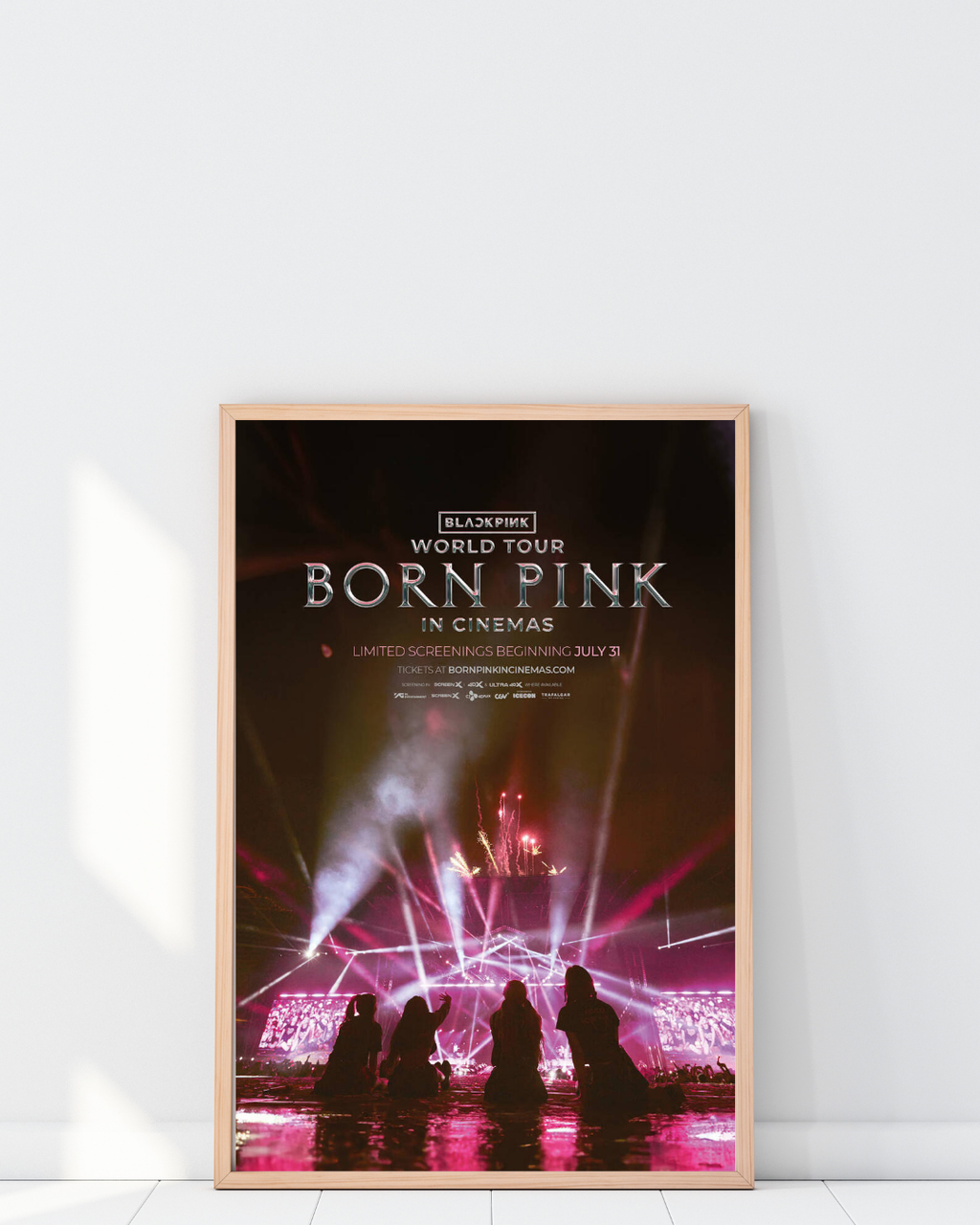 Framed BLACKPINK concert poster featuring a dramatic stadium scene with fireworks and crowd, creating a dynamic and immersive atmosphere.